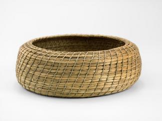 A basket that's low and circular. 