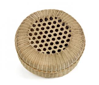 A basket with a circular base and lid with holes in the top.