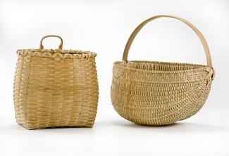 Two baskets, one that's square on the bottom with a circular top and one that's a half circle shape with a handle.