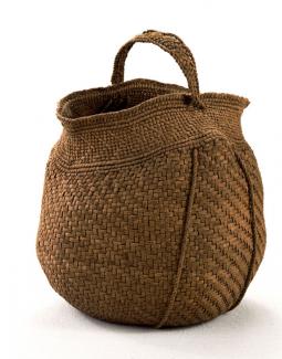 A basket that is circular with a shape that looks to be malleable.