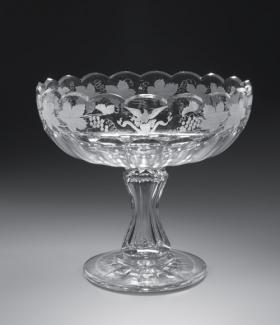 An image of a cut and engraved glass compote bowl.