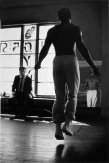 Parks' gelatin silver print of Ali jumping with a jumprope. 