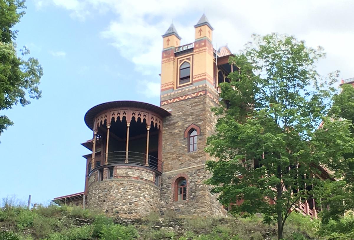 A photograph of a house from below. 