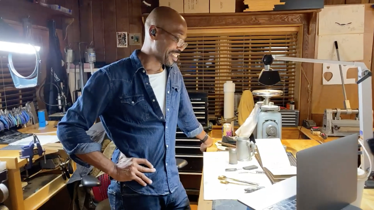 Photo of artist David Harper Clemons working in his studio.