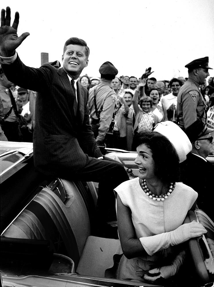 Senator Kennedy waving from car