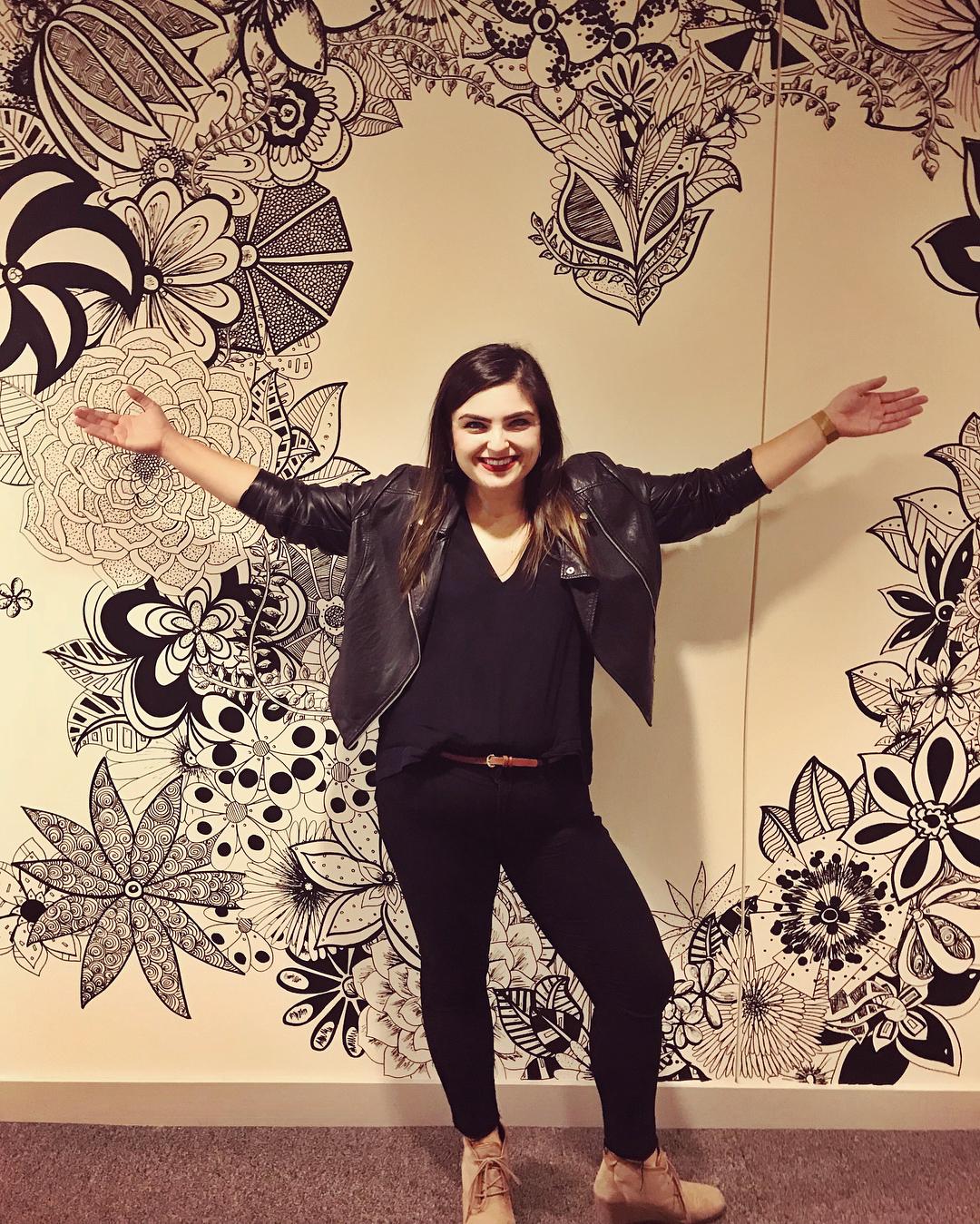 woman posing in heart frame panda wall mural