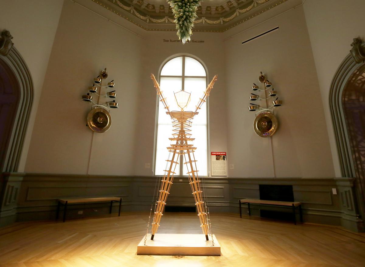 An image of Kuffner's gongs hanging on the wall of a room inside the Renwick Gallery.