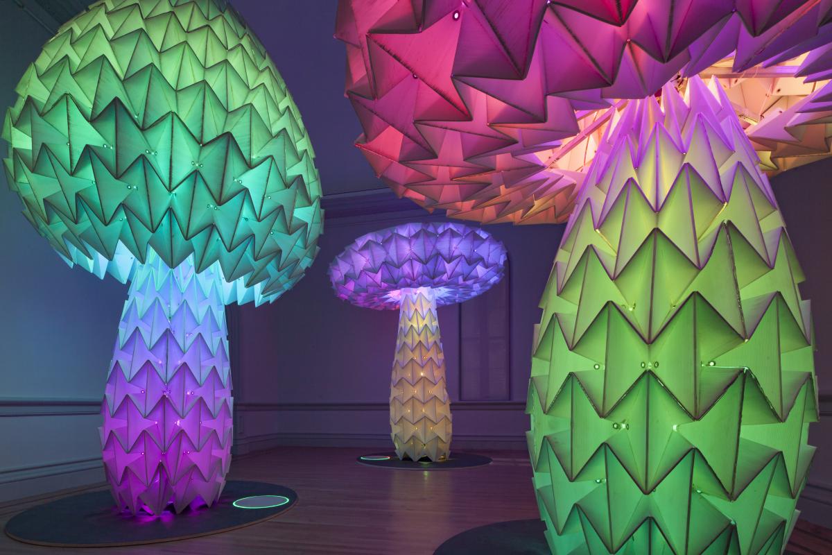 This is an image of three sculpture pieces that look like mushrooms inside the Renwick Gallery.