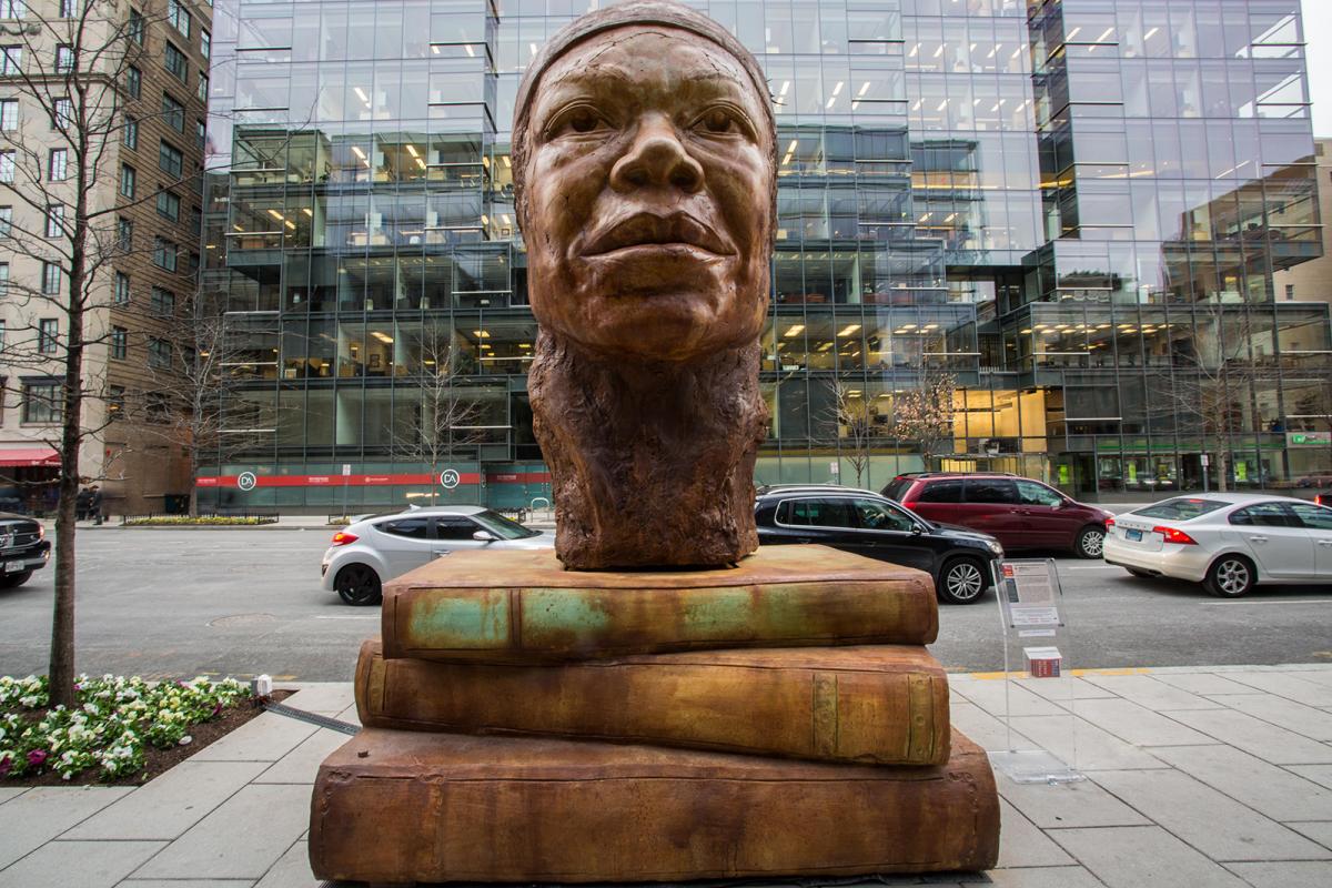 An image of Maya Angelou outside in the Golden Triangle district of D.C.