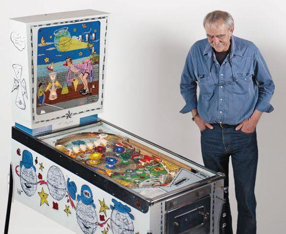 William T. Wiley stands next to his Punball: Only One Earth