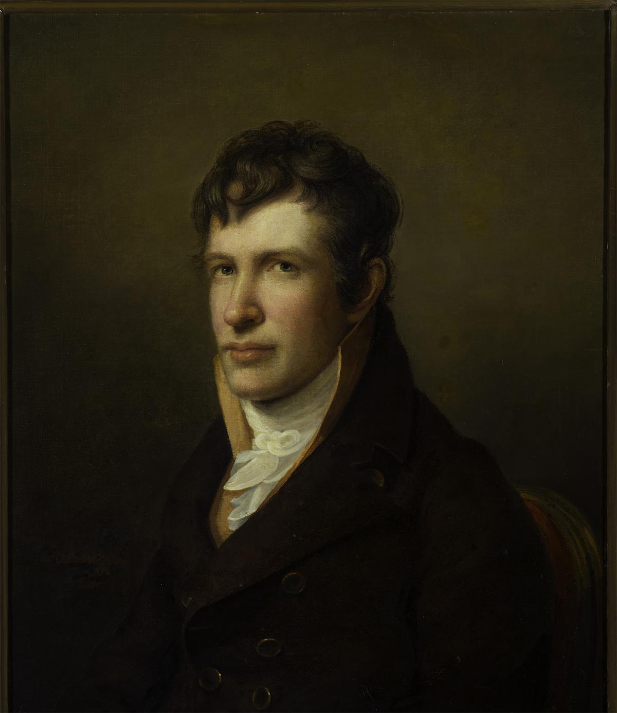 A portrait of a man sitting. 