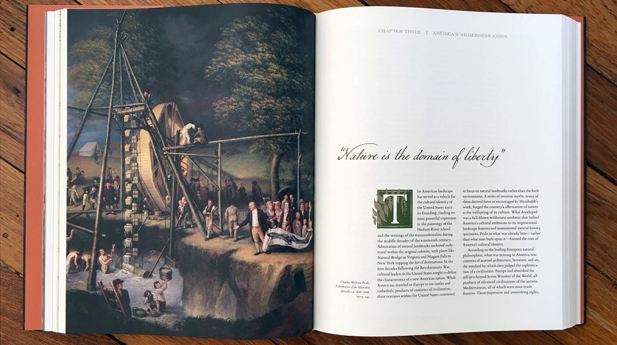 A photograph of a book open on a table. 