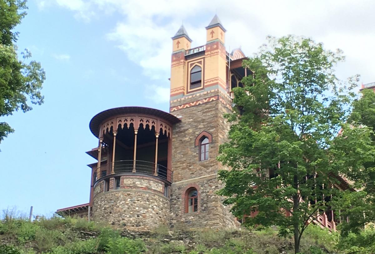 A photograph of a house from below. 