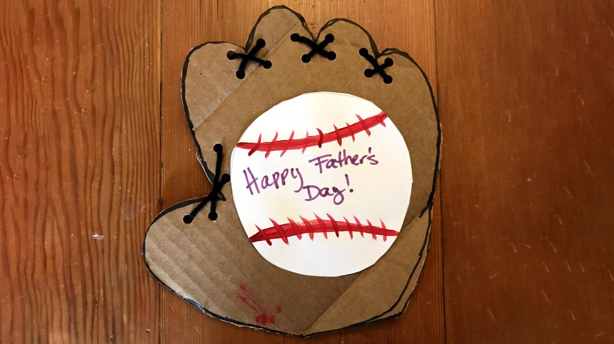 A photograph of a handmade card with a baseball