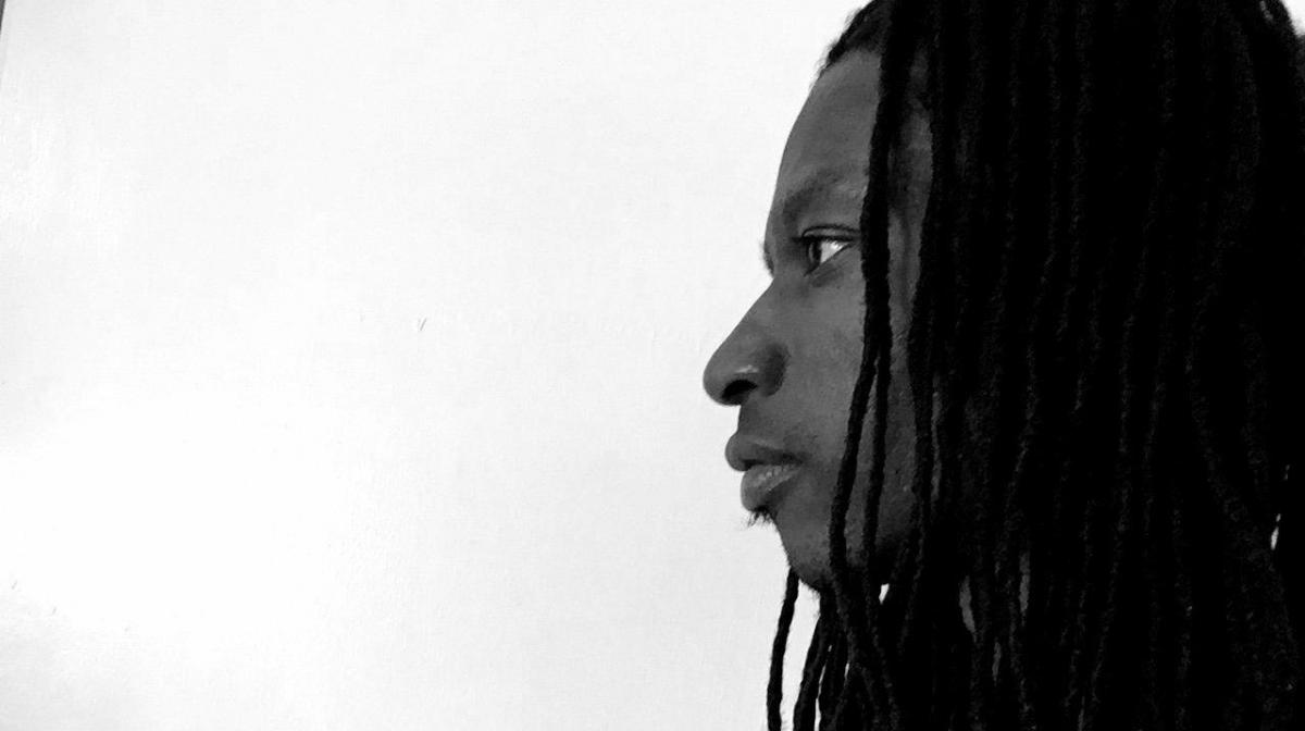 A photograph of a man's profile.