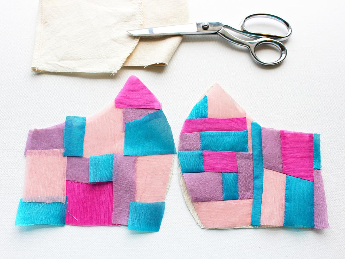 A photograph of material with scissors 