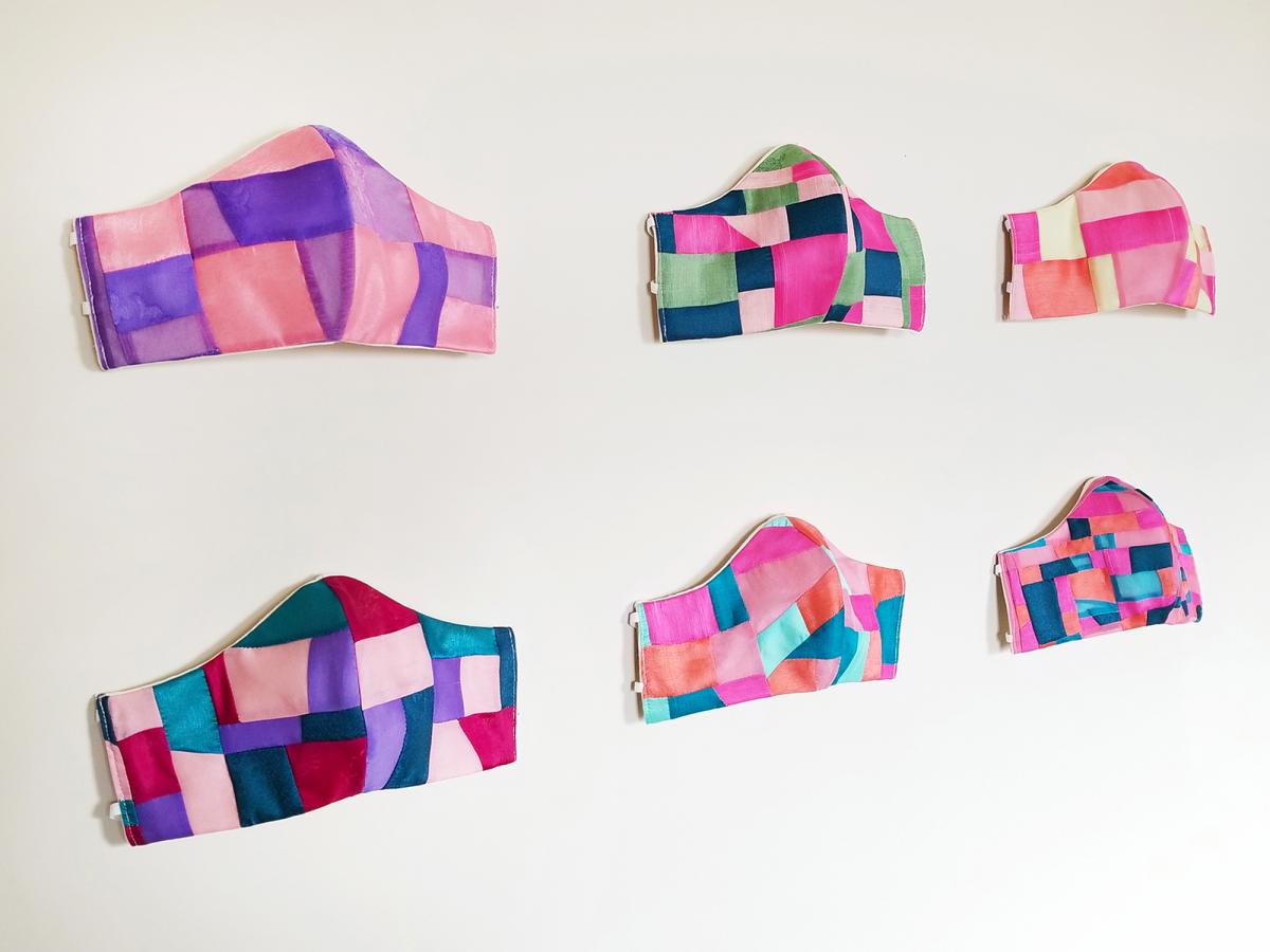 A wall with face masks 