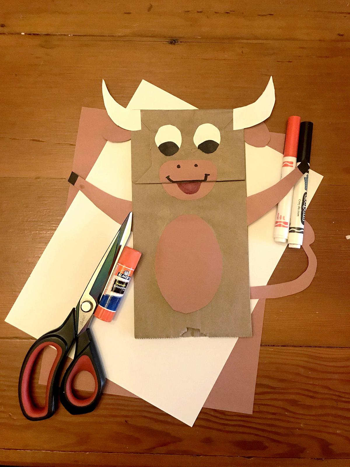 A photograph of a paper bag that looks like an ox.