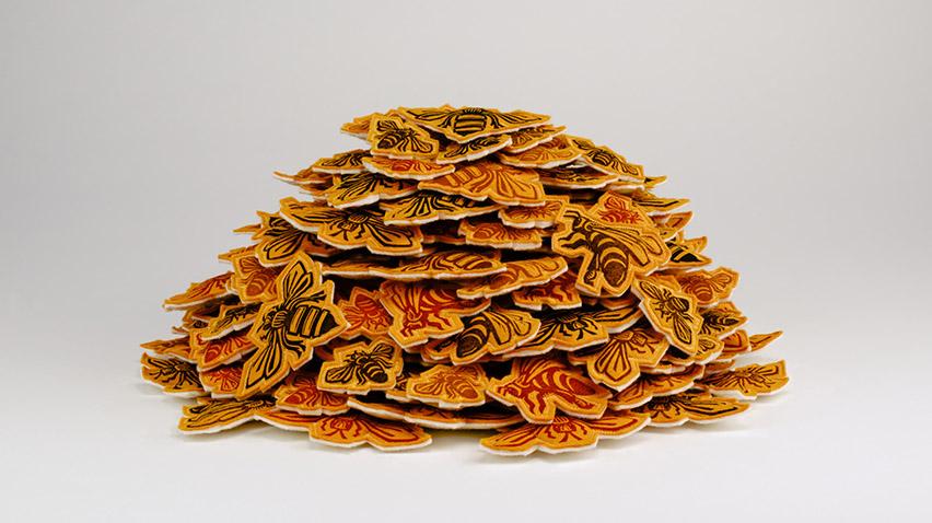 Pile of hand-sewn felt bees