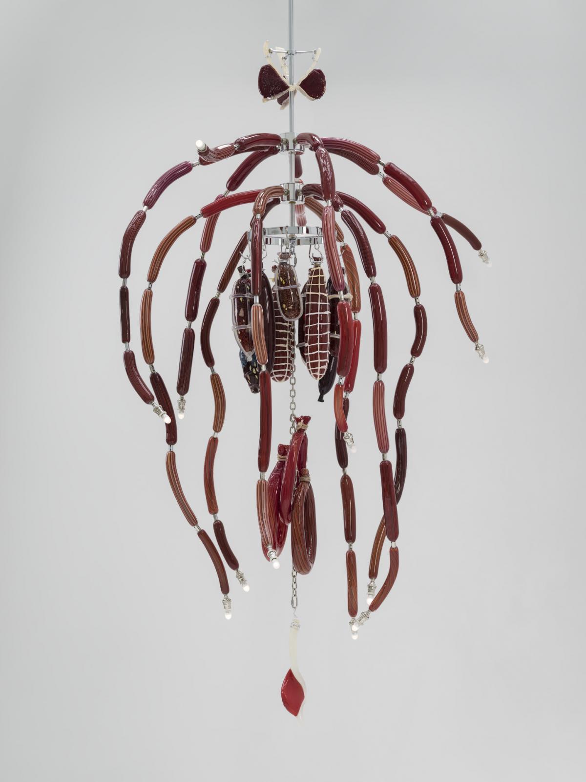 A chandelier made of glass that looks like meat.