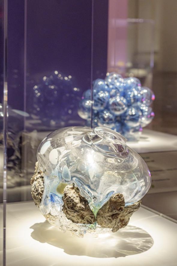 A chandelier made of glass that looks like meat.