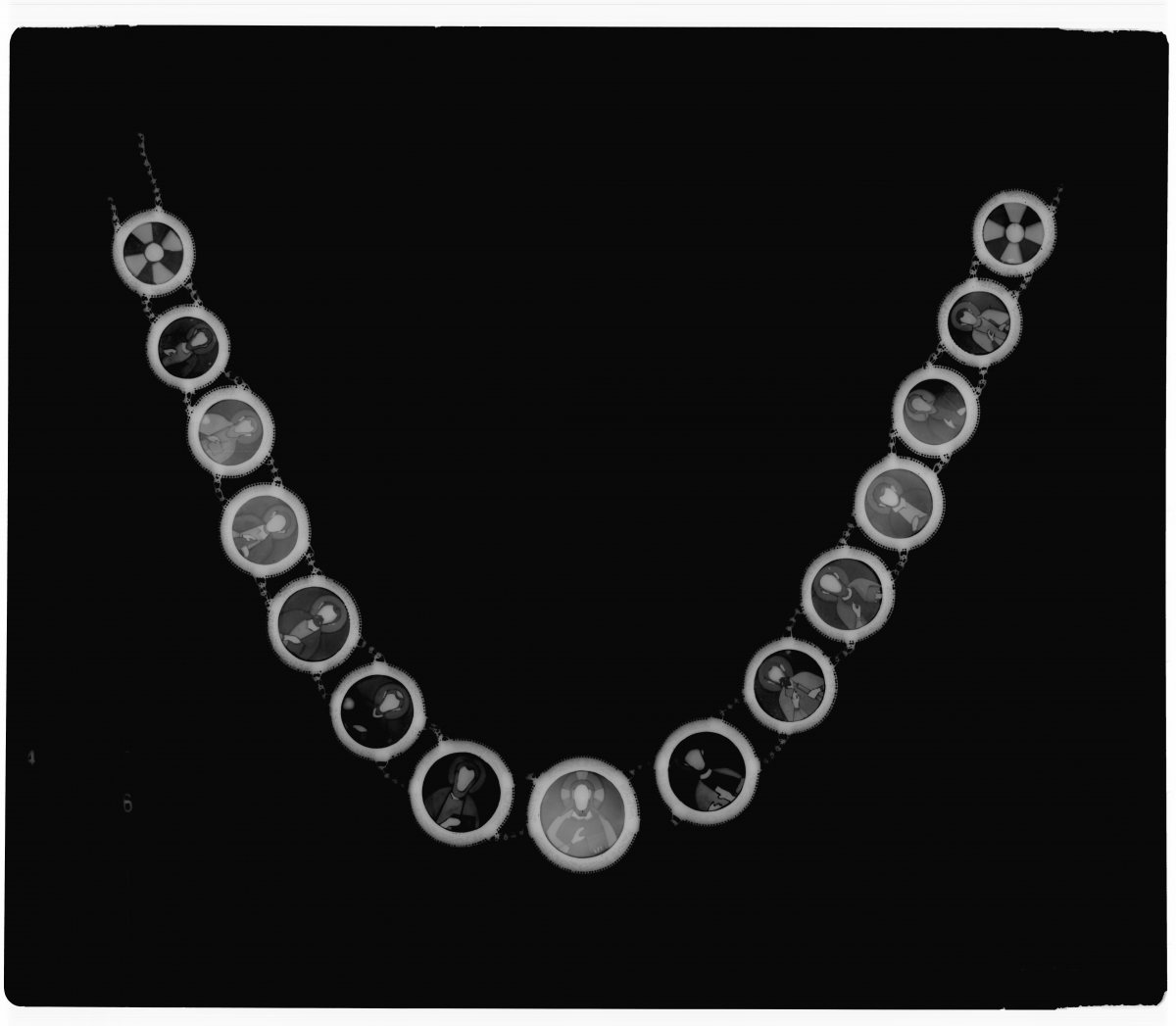 A black and white image of a necklace that has been radiographed