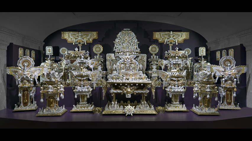 A large-scale throne made of found objects.