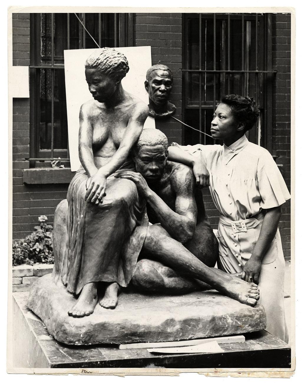 Artist Augusta Savage with her sculpture
