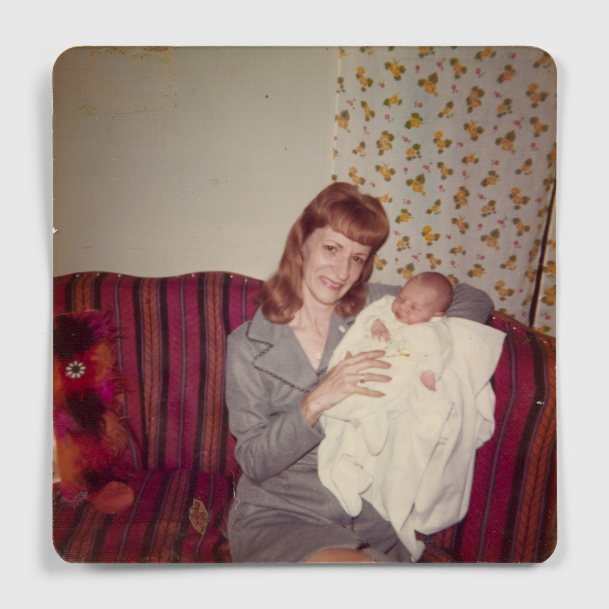 Photograph of woman holding a baby