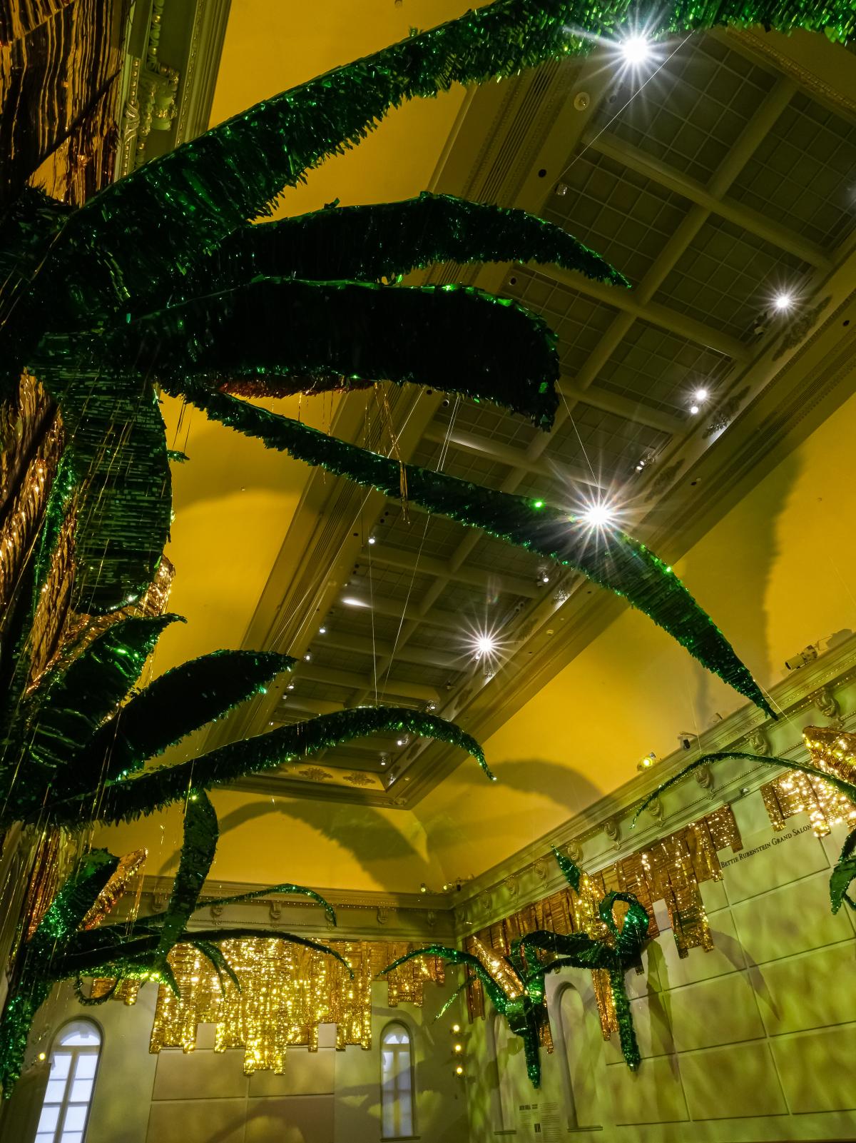 Large-scale installation of corncob piñatas.