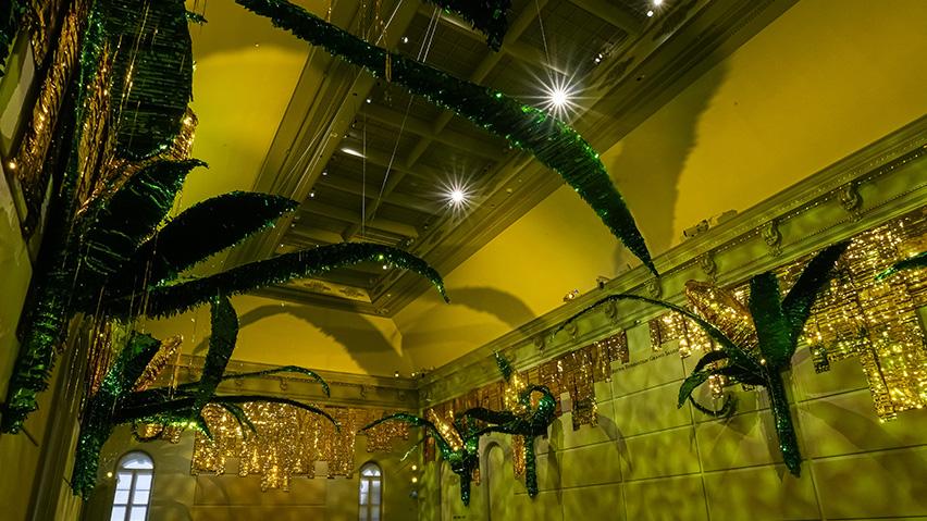 Large-scale installation of corncob piñatas.