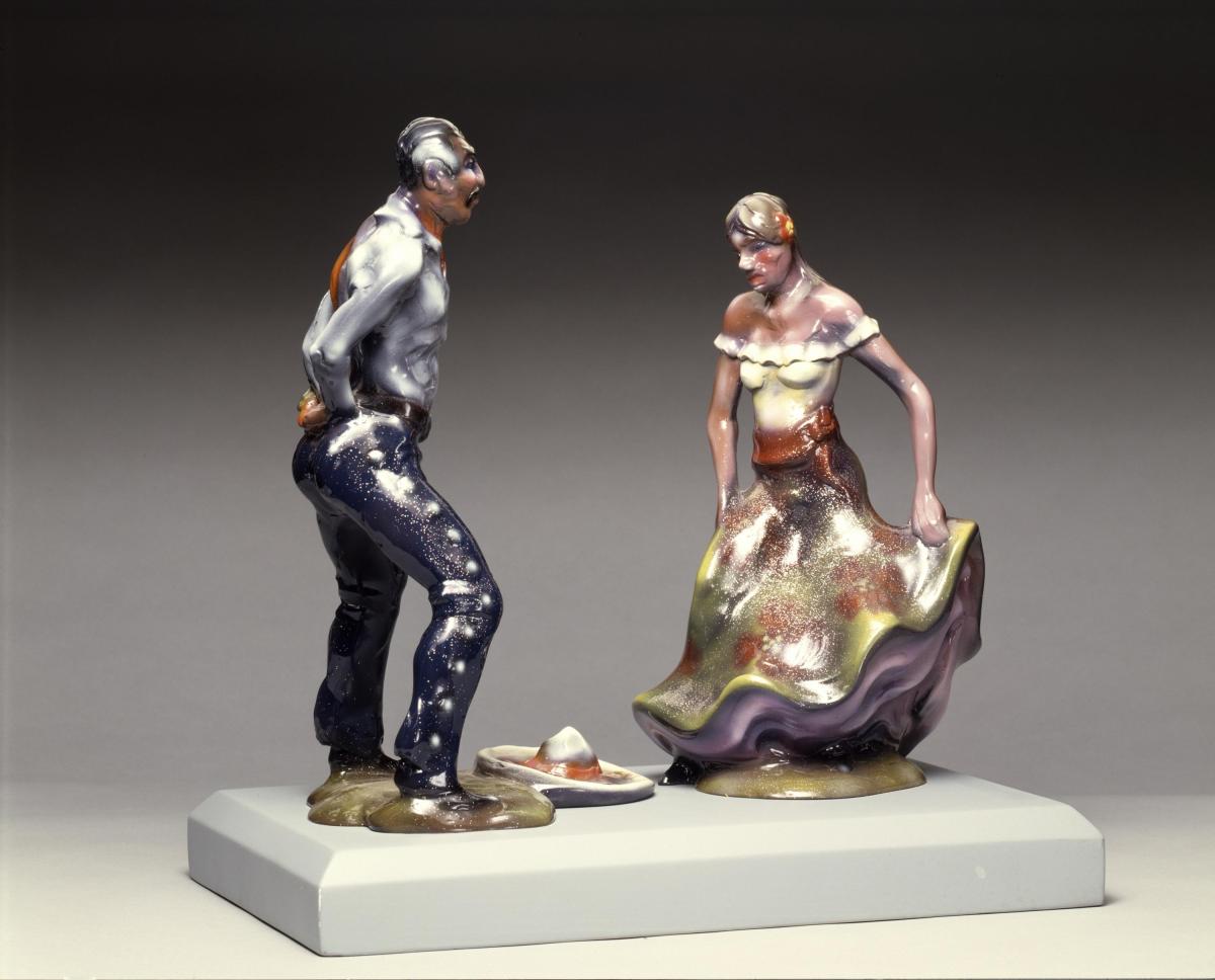 Fiberglass model of man and woman dancing.