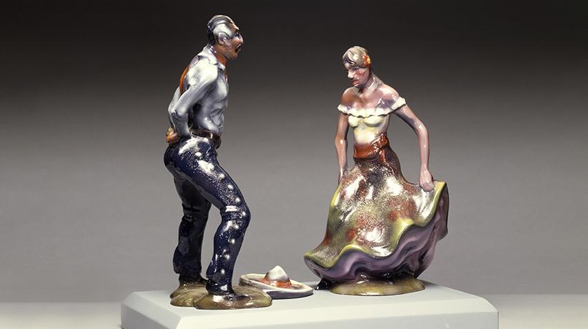 Fiberglass model of man and woman dancing.