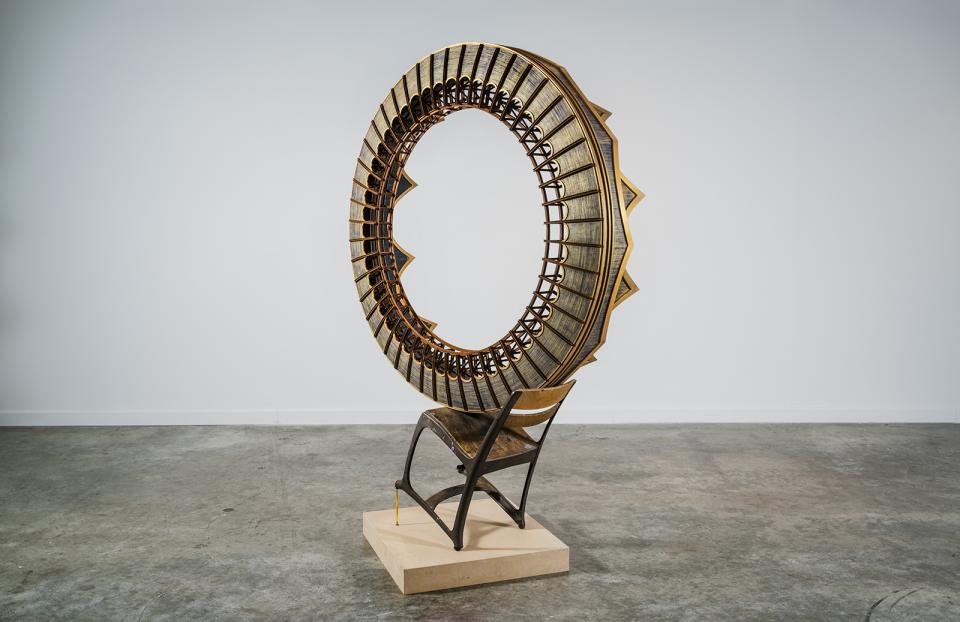 Exhibitions - Disrupting Craft, Renwick Invitational This is a picture of a circular sculpture piece resting on a chair.