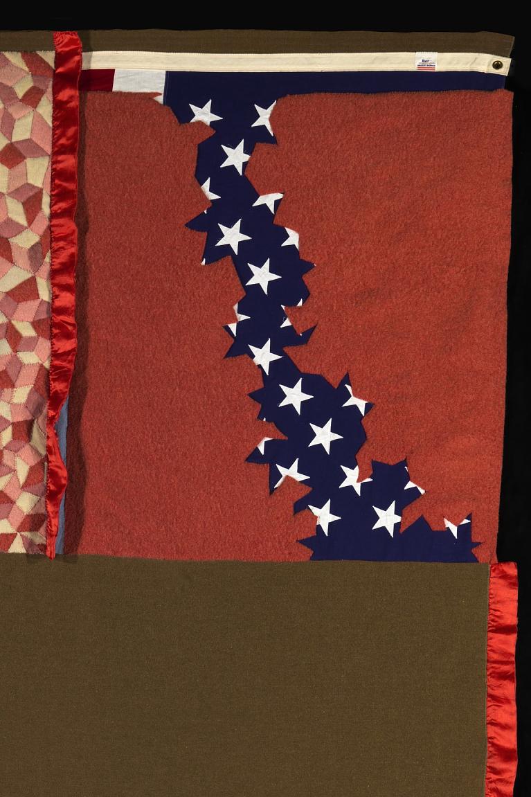 A quilt made of multiple materials.