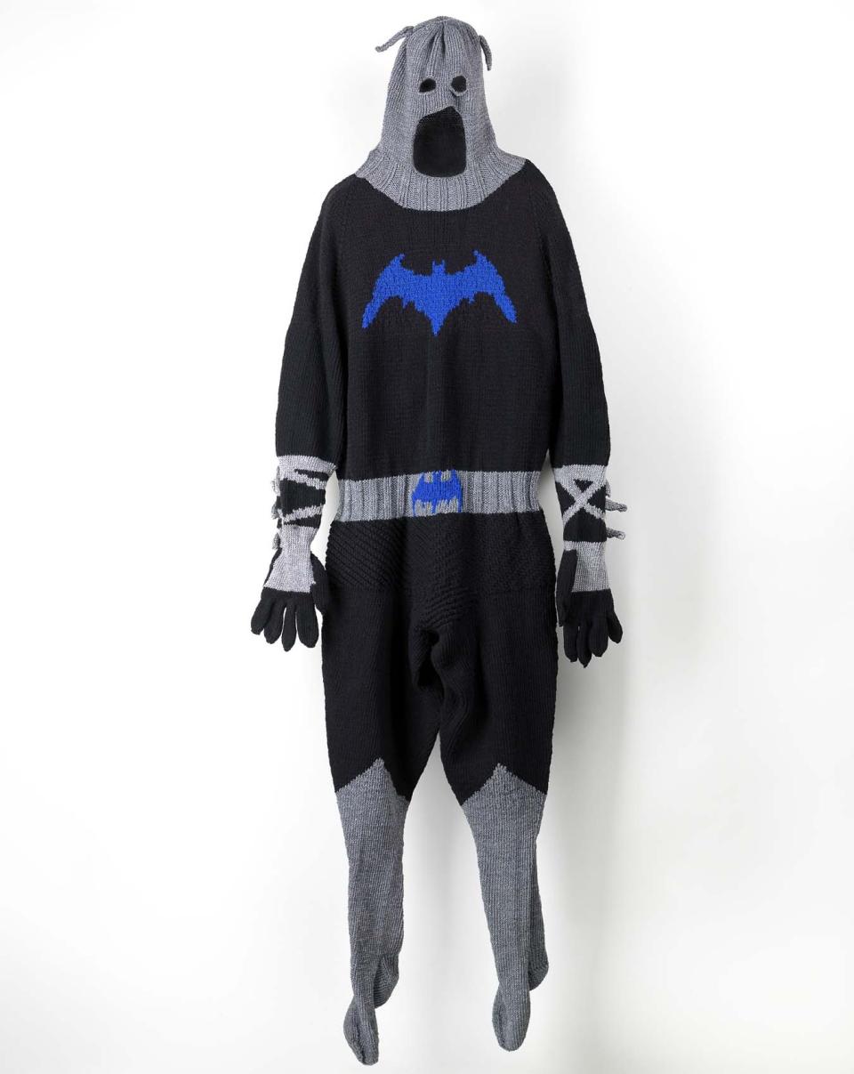 A costume of batman that's made of thread. 