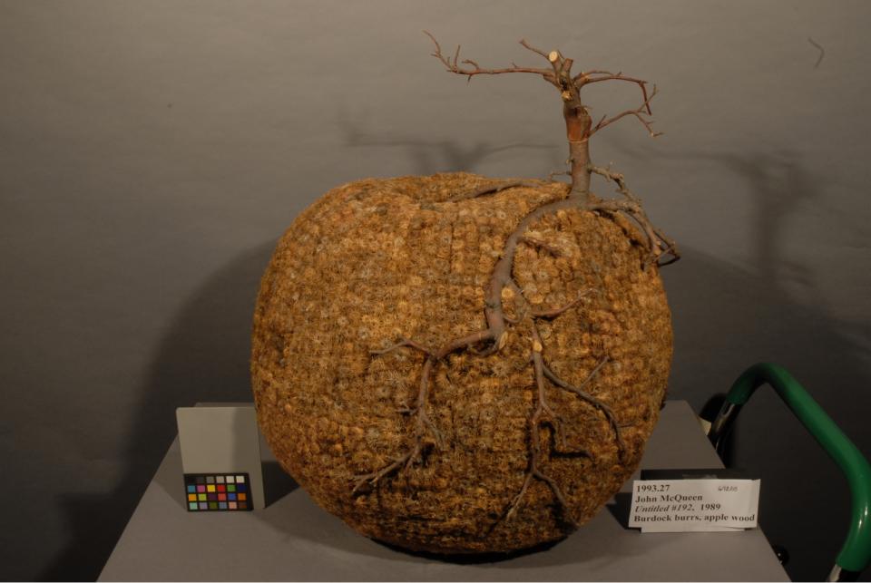 A McQueen Burr sculpture is shown under raking light