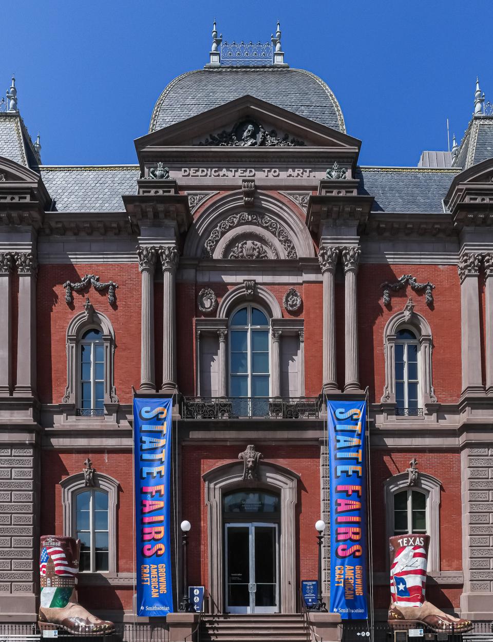 Exterior of the Renwick Gallery with State Fairs banners at the entrance.
