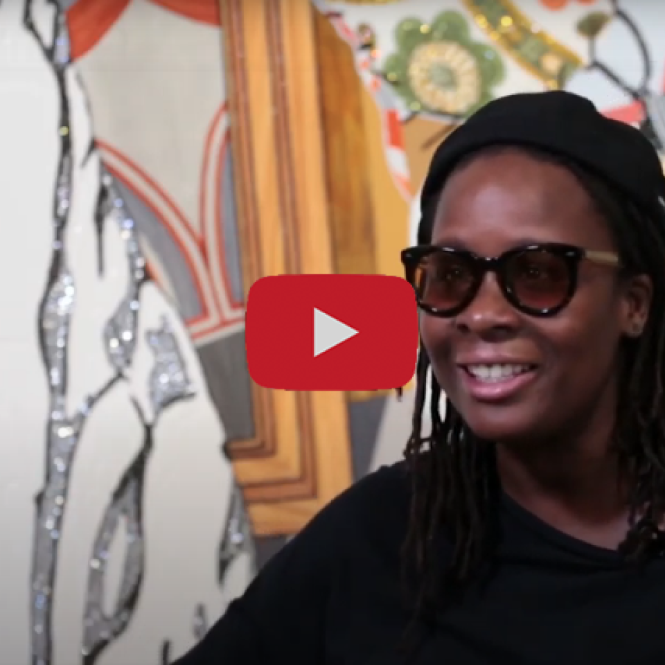 Card - Meet the Artist Video Series, Mickalene Thomas A photograph of a woman in front of an artwork