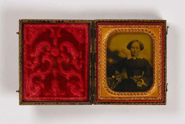 A ambrotype shows Mrs. Glenalvin Goodridge sitting down