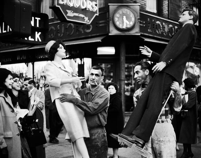 Movers carrying mannequins