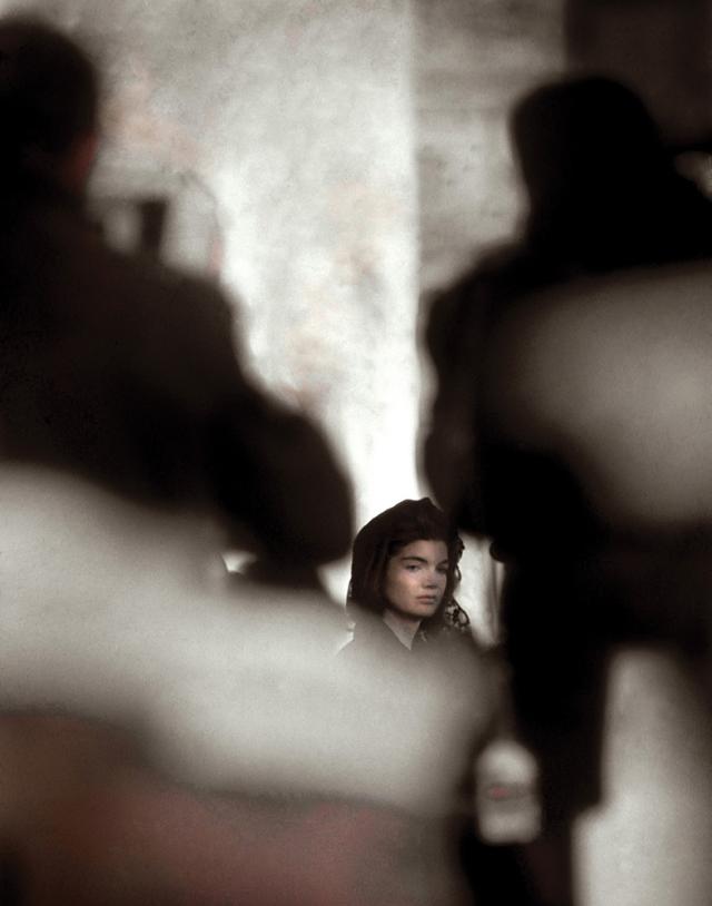 Photo of Jackie Kennedy in the receding distance