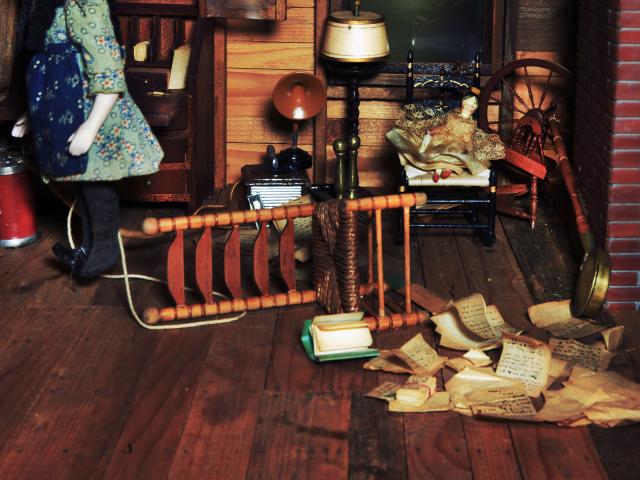 A photograph of a nutshell study of unexplained death showing a detail of attic where a hanging took place.