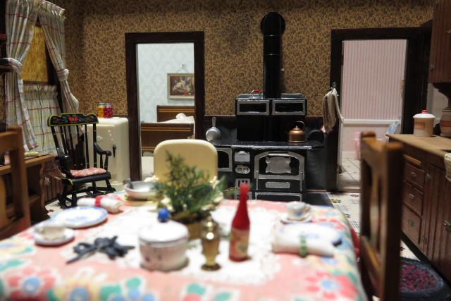 A photograph of a nutshell study of unexplained death showing a detail of a kitchen.