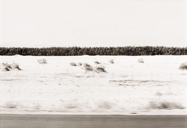 A photograph of a Southern California landscape by automobile.
