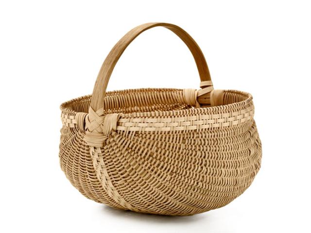 A basket shaped like a melon with a handle.