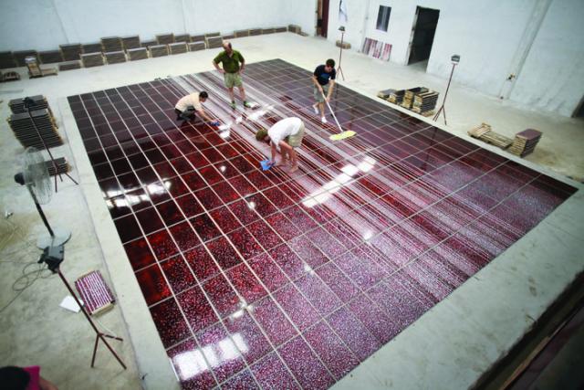 Wayne Higby producing SkyWell Falls with assistants in China. 