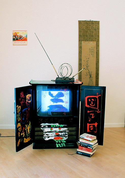 Name June Paik's Chinese Memory video installation with 21" television.