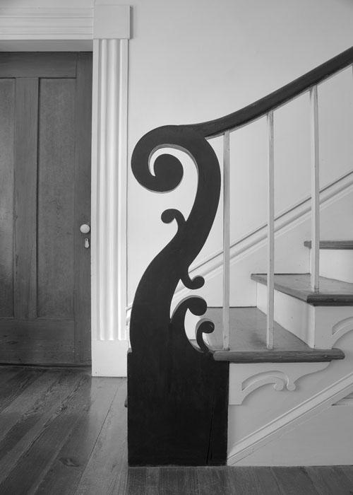 A photograph of the end of a staircase. 