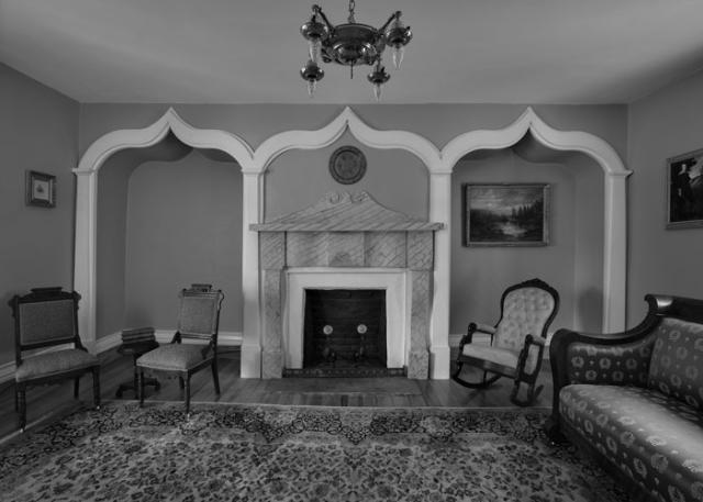 A photograph inside a parlor.